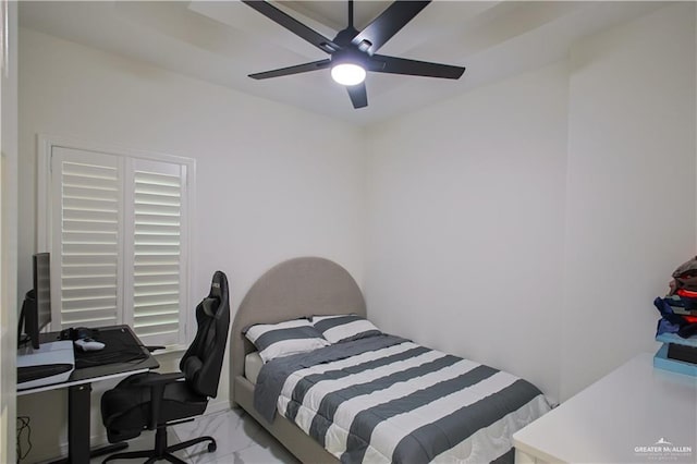 620 N Oaxaca St, Alton, TX 78573 - bedroom with marble finish flooring, a desk, and a ceiling fan