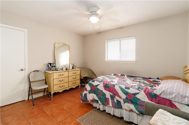 bedroom with light tile patterned floors and ceiling fan