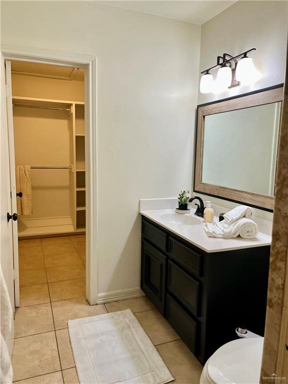 bathroom featuring tile patterned floors and vanity