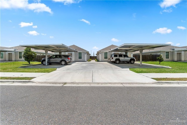 912 Kentucky St, Alton, TX 78573 - view of front facade featuring covered parking and a residential view