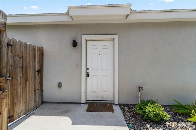 912 Kentucky St, Alton, TX 78573 - property entrance featuring stucco siding