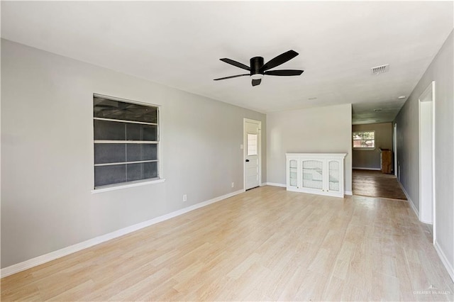 1125 W Schunior St, Edinburg, TX 78541 - spare room with ceiling fan and light wood-style floors