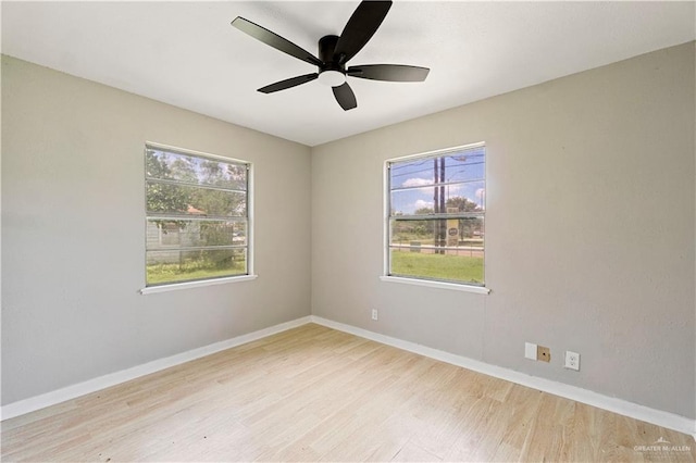 1125 W Schunior St, Edinburg, TX 78541 - spare room featuring healthy amount of natural light, ceiling fan, and wood finished floors