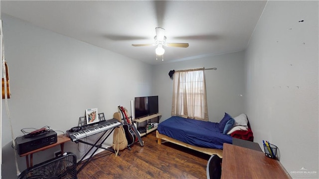 bedroom featuring dark hardwood / wood-style floors and ceiling fan