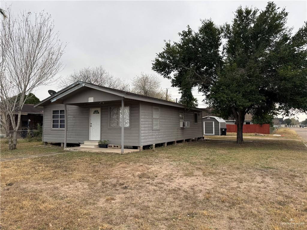 view of front of home with a front yard