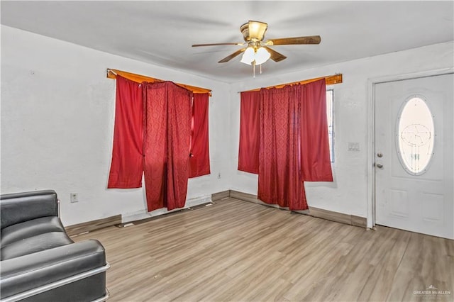 2606 Lissner Ave, Donna, TX 78537 - foyer entrance featuring ceiling fan, wood finished floors, and baseboards