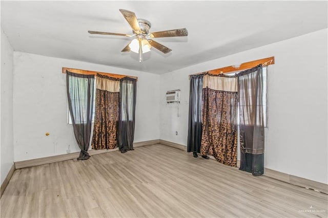 2606 Lissner Ave, Donna, TX 78537 - spare room with wood finished floors, a ceiling fan, and baseboards