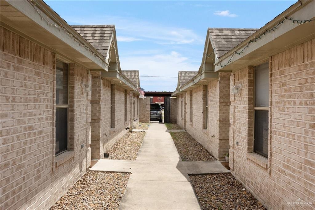 view of property exterior featuring a carport