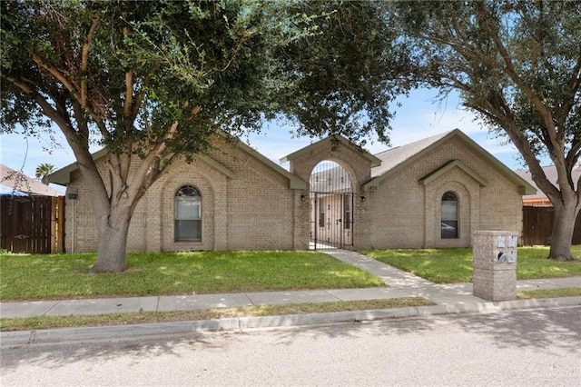 view of front facade with a front lawn