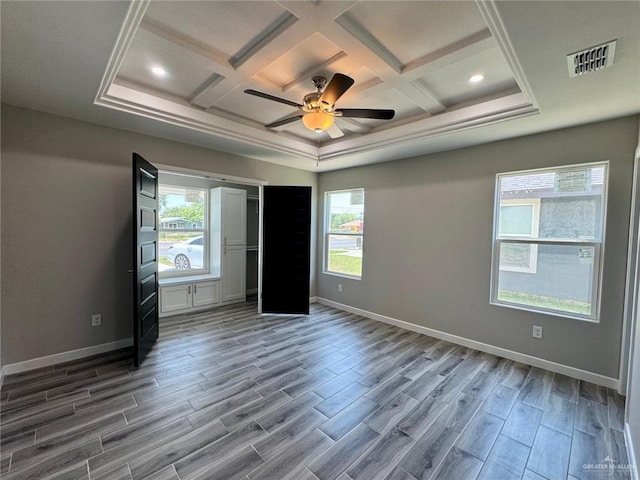 209 S Raul Longoria Rd, Edinburg, TX 78542 - unfurnished bedroom featuring coffered ceiling, wood finished floors, baseboards, recessed lighting, and beam ceiling
