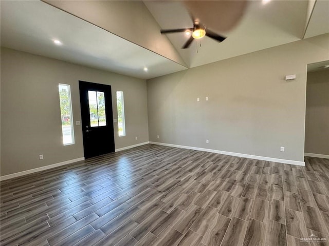 209 S Raul Longoria Rd, Edinburg, TX 78542 - foyer with dark wood-style floors, baseboards, a ceiling fan, lofted ceiling, and recessed lighting