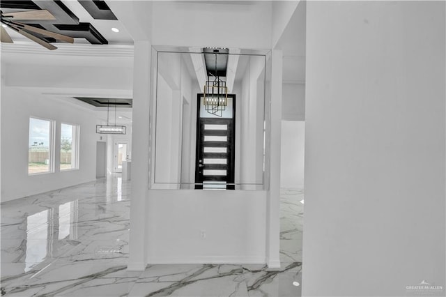 interior space with marble finish floor, a chandelier, and recessed lighting