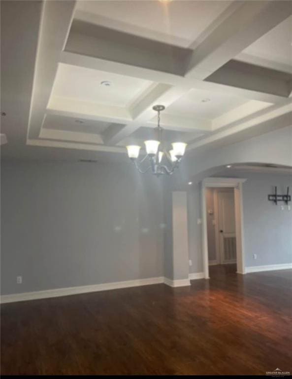 1516 S 14th Ave, Edinburg, TX 78539 - unfurnished room with a chandelier, coffered ceiling, wood finished floors, beamed ceiling, and baseboards