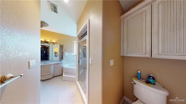 full bathroom featuring tile patterned flooring, vaulted ceiling, toilet, vanity, and independent shower and bath