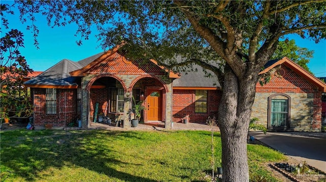 view of front of home with a front yard