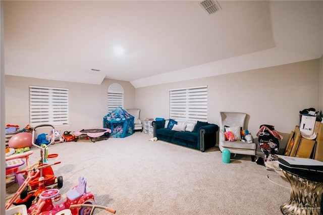 playroom with carpet flooring and lofted ceiling