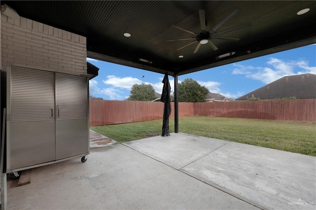 view of patio / terrace featuring ceiling fan