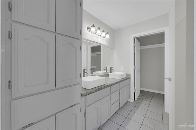 bathroom featuring tile patterned floors and vanity