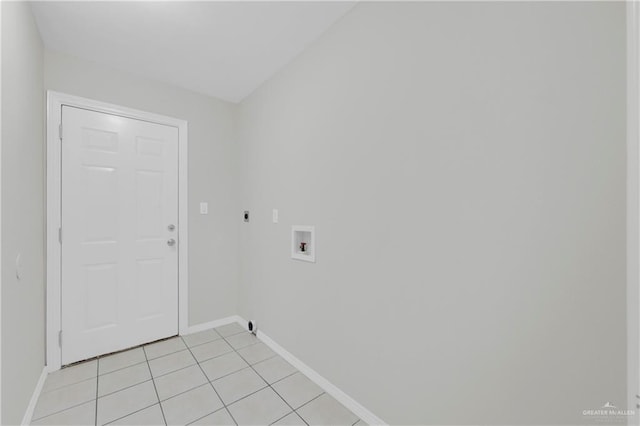 laundry room featuring washer hookup, electric dryer hookup, and light tile patterned floors