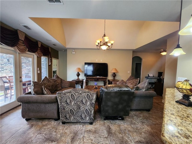 living room featuring an inviting chandelier