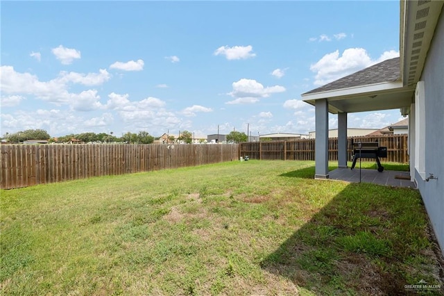 view of yard featuring a fenced backyard and a patio area