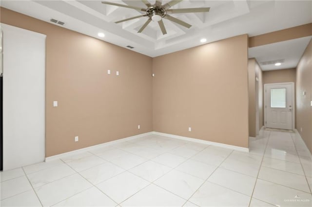 empty room featuring a ceiling fan, recessed lighting, visible vents, and coffered ceiling