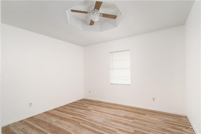 420 N Beto Garcia Dr, Weslaco, TX 78596 - spare room with light wood-type flooring, ceiling fan, and baseboards