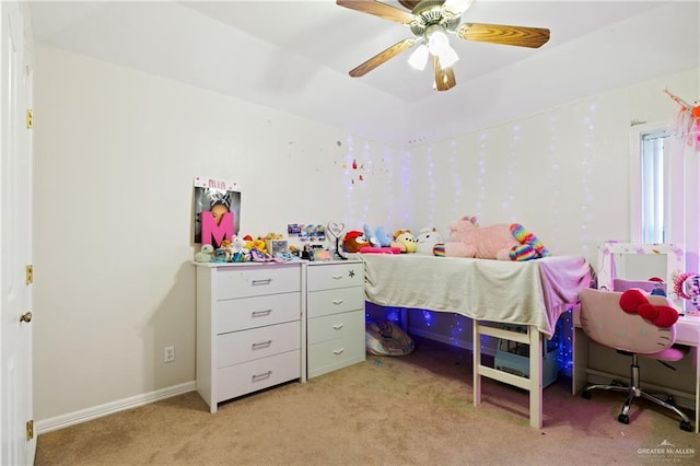 bedroom with ceiling fan and light colored carpet