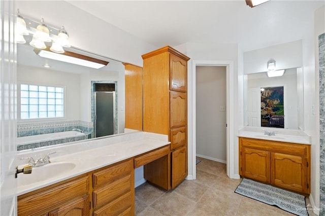 bathroom featuring separate shower and tub, vanity, and tile patterned flooring