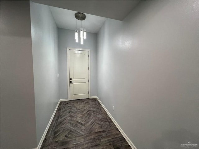 corridor featuring dark parquet floors