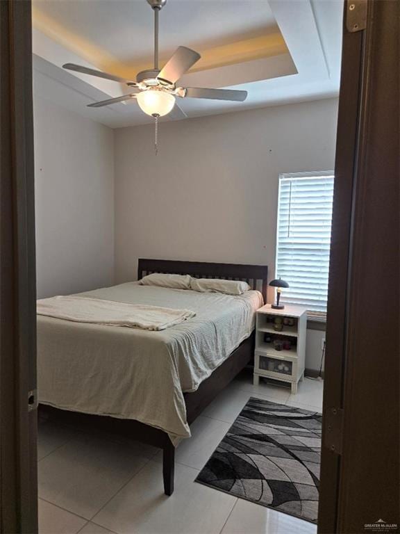 4012 Whitewing Ave, Edinburg, TX 78539 - bedroom featuring light tile patterned floors and a ceiling fan