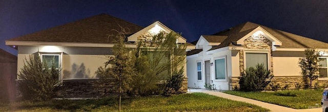 4012 Whitewing Ave, Edinburg, TX 78539 - view of front of house featuring stone siding and stucco siding