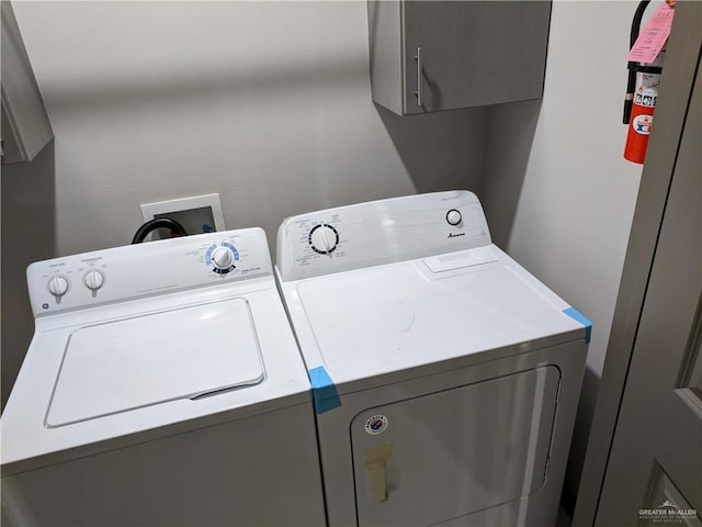 4012 Whitewing Ave, Edinburg, TX 78539 - washroom with separate washer and dryer and cabinet space