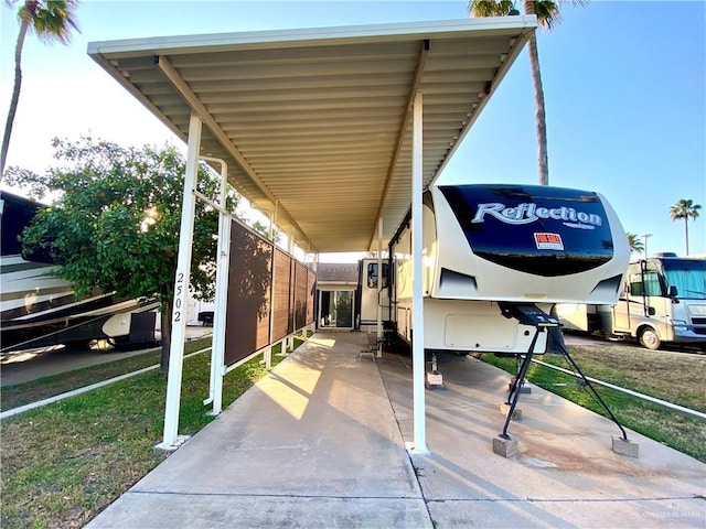 view of parking featuring a carport