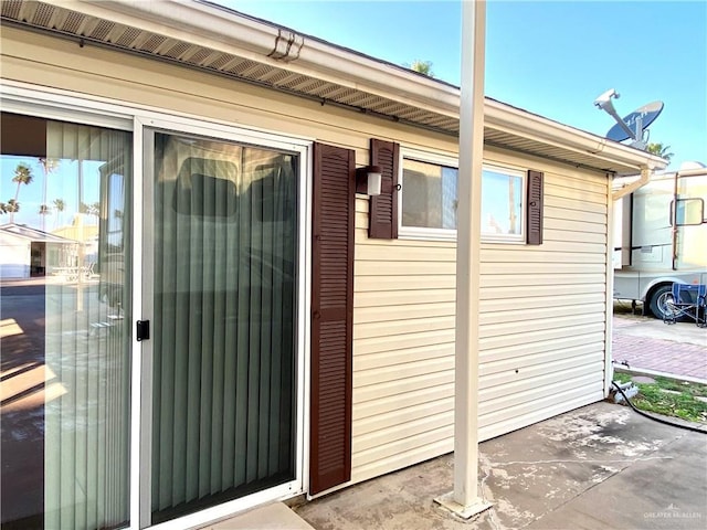 doorway to property with a patio