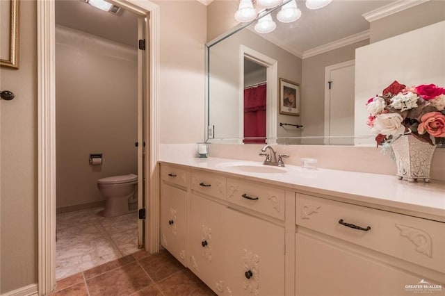 bathroom with toilet, an inviting chandelier, ornamental molding, and vanity