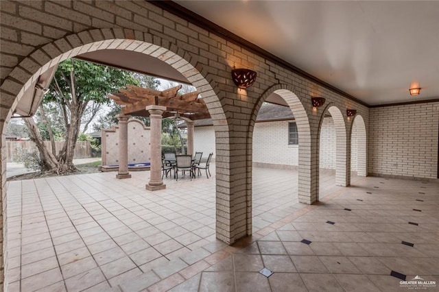 view of patio / terrace with outdoor dining area and a pergola