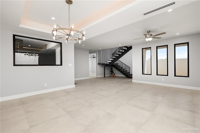 unfurnished room with ceiling fan with notable chandelier