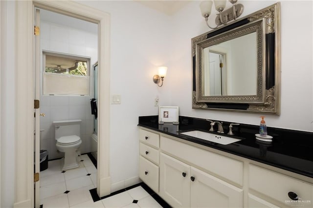 full bathroom with vanity, toilet, and shower / bath combination