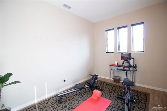 14616 Kurth Cv, Mcallen, TX 78504 - exercise area featuring wood finished floors and baseboards