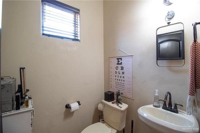 14616 Kurth Cv, Mcallen, TX 78504 - bathroom featuring a sink and toilet