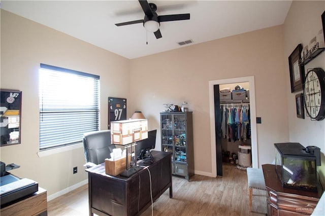 14616 Kurth Cv, Mcallen, TX 78504 - home office featuring a ceiling fan, light wood-style floors, and baseboards
