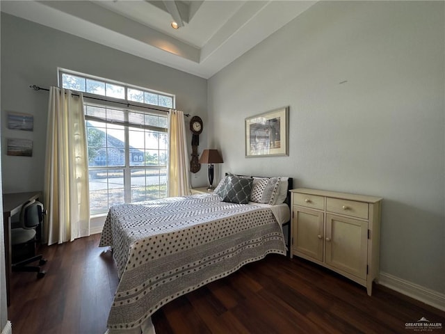 bedroom with dark hardwood / wood-style flooring