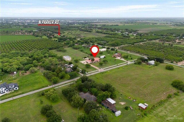 12612 E Clark Rd, La Feria, TX 78559 - aerial view of property and surrounding area featuring rows of crops and rural landscape