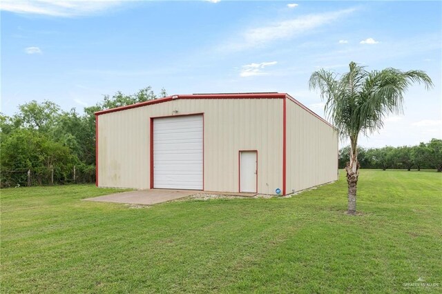 12612 E Clark Rd, La Feria, TX 78559 - view of outbuilding featuring an outdoor structure and driveway