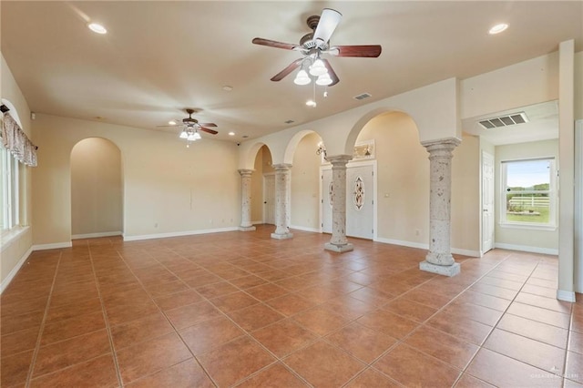 12612 E Clark Rd, La Feria, TX 78559 - unfurnished living room with recessed lighting, tile patterned flooring, decorative columns, a ceiling fan, and arched walkways