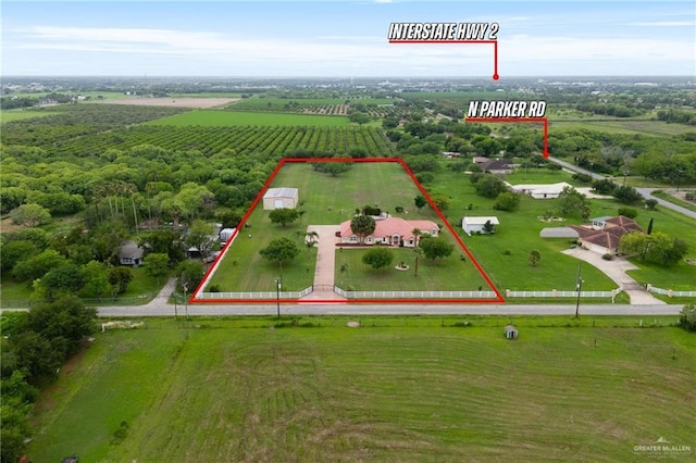 12612 E Clark Rd, La Feria, TX 78559 - aerial view of sparsely populated area featuring property parcel outlined and farmland