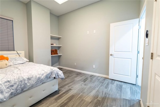 bedroom featuring hardwood / wood-style flooring