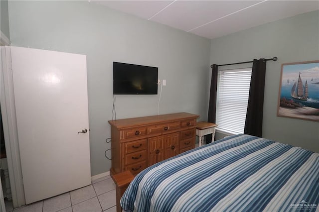 125 E Georgia Ruth Dr Unit B202, South Padre Island, TX 78597 - bedroom with light tile patterned floors