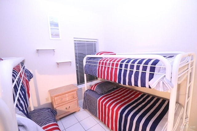 125 E Georgia Ruth Dr Unit B202, South Padre Island, TX 78597 - bedroom featuring light tile patterned flooring